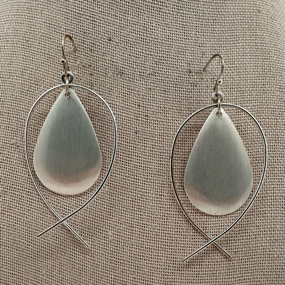 Silvertone geometric movement dangle earrings
